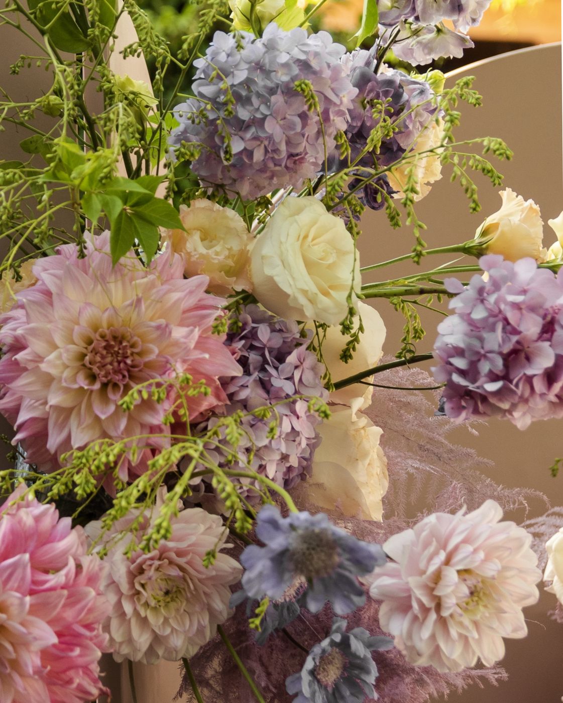 Birthday floral installation with dahlias, hydrangeas and roses