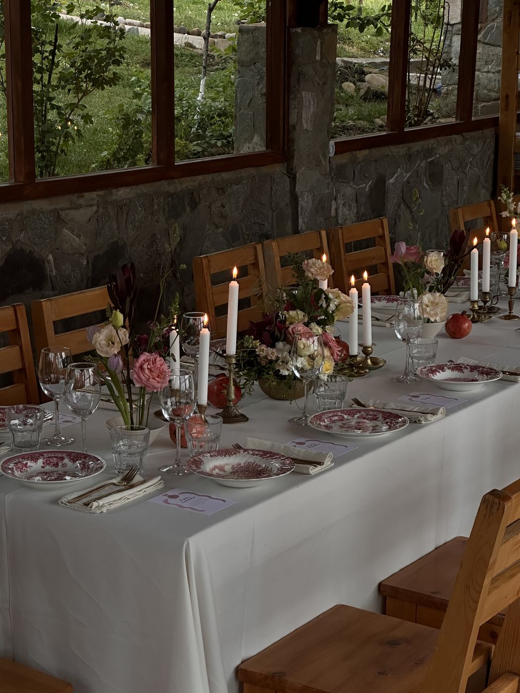 Candlelit private dinner with pink flowers